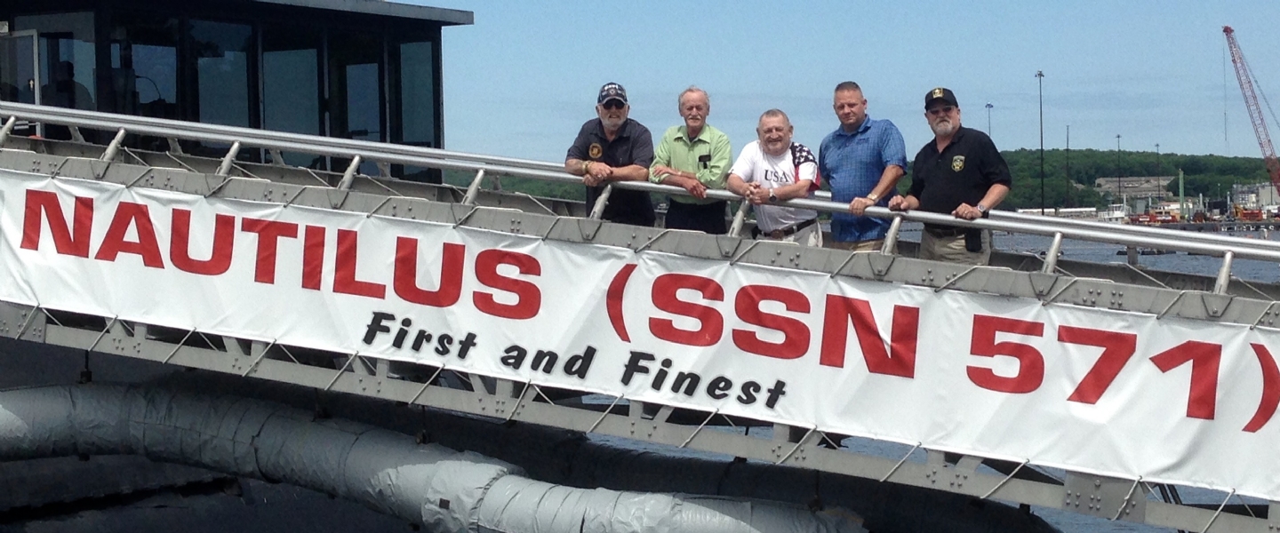 Past State Commander Bob Priest, Rusty Meek, Bob Bailey and State Sr. Vice Commander Dave Greene aboard the Nautilus Submarine in Groton, with National VFW Programs Director Lynn Rolf